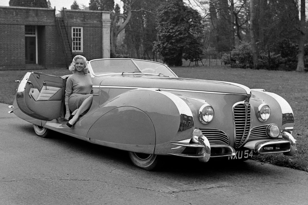 Actress Diana Dors with her 1949 Delahaye 175 S Saoutchik Roadster